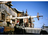 Bathymetric Survey, 9 April-12 May 1987 : At Elizabeth Reef installing the Magnavox equipment on the wreck of the Yoshin Maru lwaki.