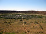 Wolfe Creek Meteorite Crater from western side of rim on 13 August 2010. The Groundmarking party’s helicopter landed  in the crater in mid-1969.