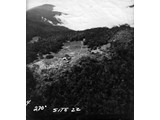 1963 : Aerial photograph of Station 22, named MYOLA, on Mount Kenevi. Mt Kevevi was also occupied by Nat Map during the geodetic survey of PNG. 
