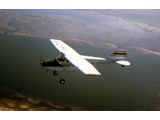 1979 : Cessna 170A VH-CAS in flight near French Island, Victoria.