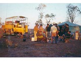 1970 : Aerodist centre party camp at (new) Andado homestead, Northern Territory in July. Standing (L-R) Norm Hawker, unknown, Michael Lloyd, unknown (with back to camera), Ken Manypenny, Ian Ogilvy, Laurie McLean, unknown. Seated both unknown.