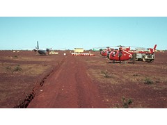 1972 TG013 Aerodist operations, WA VH-EXZ and helicopters probably at Wiluna.
