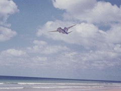 1968 : Aerodist aircraft VH-EXZ over Sandy Cape.