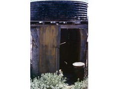 1974 : Traversing in western Queensland; old homestead watertank.