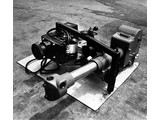 Circa early 1960s : Aerodist trilateration photographic system prior to installation in the aircraft. Left is the vertically mounted Vinten 70mm camera and right is the Wild HC-1 35mm horizon camera. At the instant of exposure by the Vinten the HC-1 captured the horizon as seen fore, aft, port and starboard of the aircraft. These four images allowed the tip and tilt of the Vinten image to be calculated for the instant of exposure.