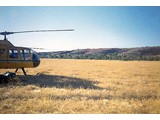 1967 : Fairchild-Hiller FH-1100 helicopter VH-UTZ (shown here at Wave Hill) chartered from Helicopter Utilities Pty Ltd, was used to support Aerodist ground marking and later Aerodist measuring operations.