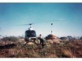 1968 : Fairchild-Hiller FH-1100 helicopters (VH-UHD) chartered from Helicopter Utilities Pty Ltd shown here at the trig on Central Mount Wedge, NT.