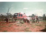 1968 : VH-UHD (L-R) Paul McCormack & Lawrie O’Connor protecting disabled Helicopter in Simpson Desert from feral camels.