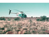 1969 : Hughes 500 369HS helicopter (VH-SFS) on charter from Jayrow Helicopters Pty Ltd was used to support Aerodist groundmarking operations. VH-SFS is shown here in the Simpson Desert.